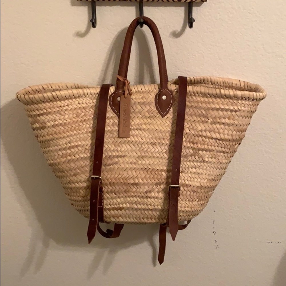 Straw and leather backpack beach bag
